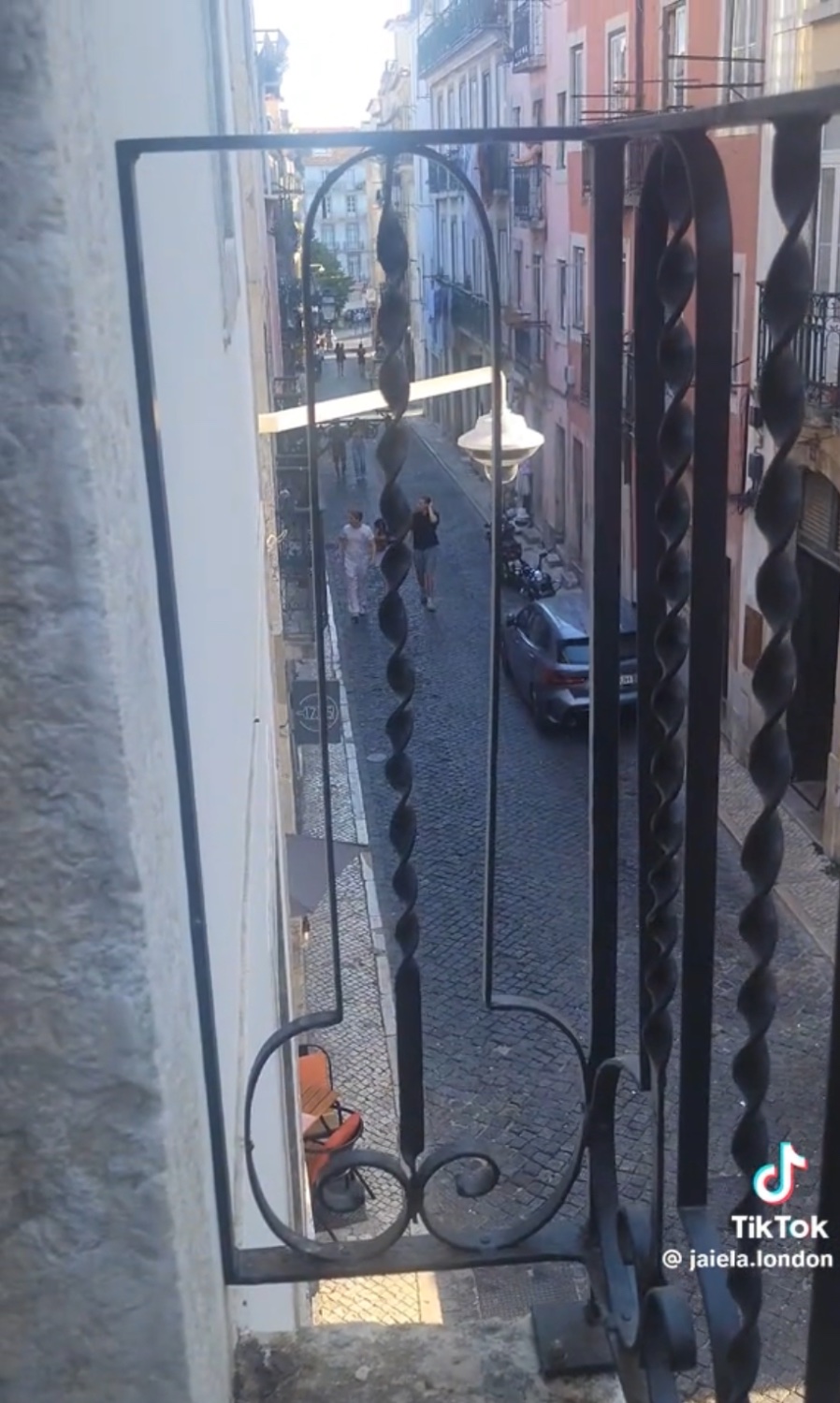 A photo of a balcony in Europe, where it’s metal work pattern is phallic